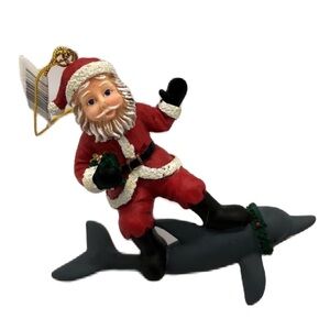 Santa Claus Riding Surfing Dolphin